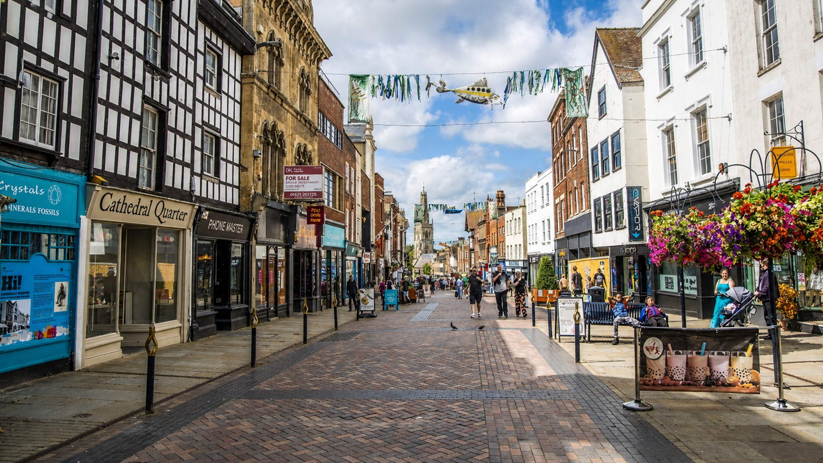 Pedestrianised UK high street lined with independent commercial properties